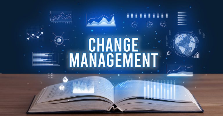 CHANGE MANAGEMENT inscription coming out from an open book, crea
